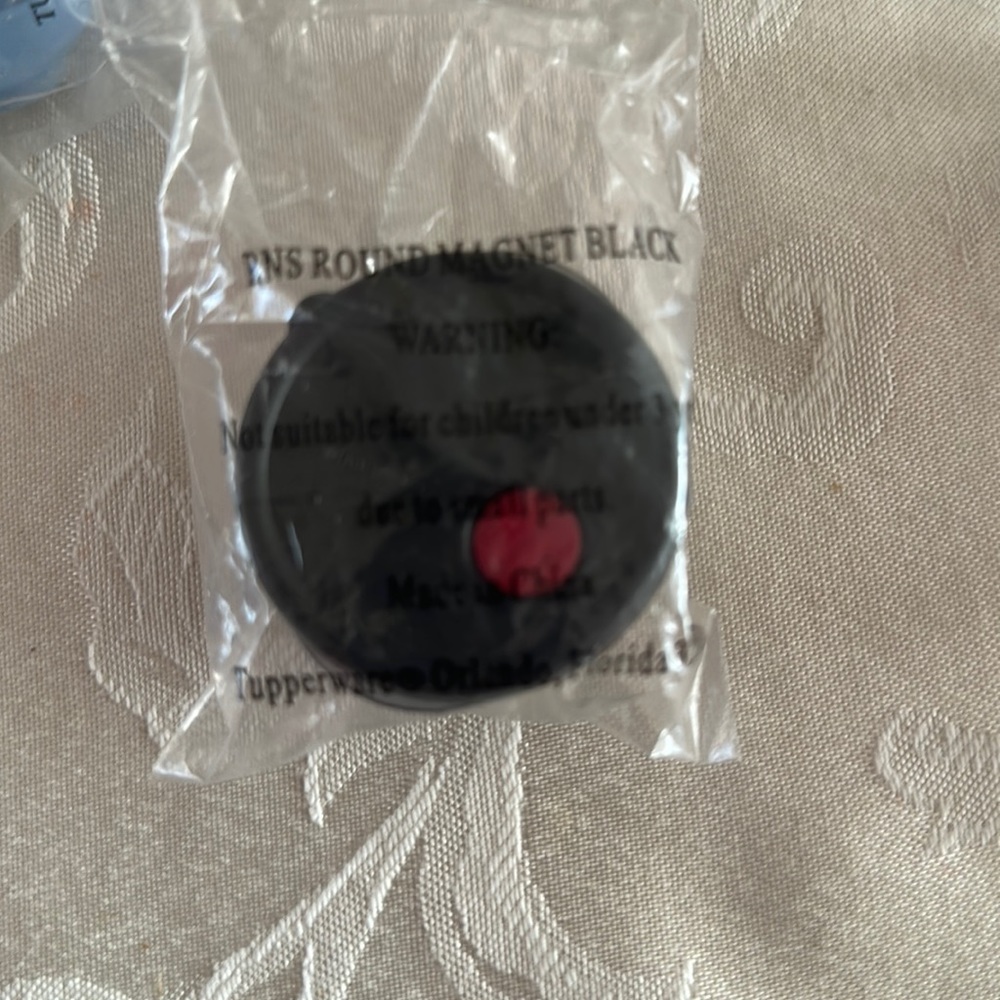 Tupperware miniature magnet. Replica of the heat and serve line.